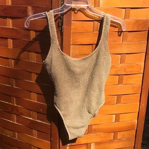 One piece knit shimmery bathing suit.